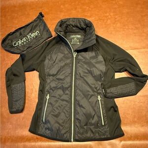 Calvin Klein Performance black jacket, pockets, carry pouch, misses size Large.
